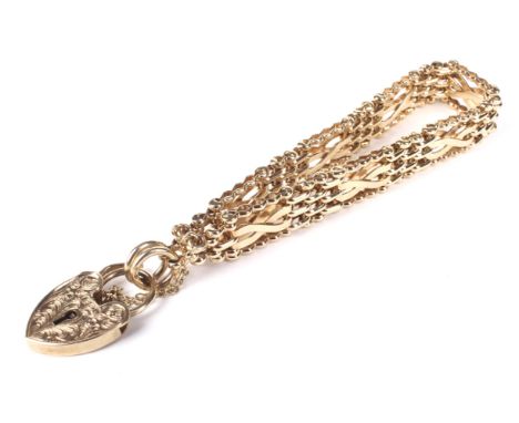 A vintage 9ct gold block and cross 'gate' bracelet. On a part foliate stamped padlock clasp with hallmarks for London 1987, m