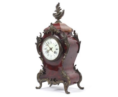 A late 19th century French Boulle work mantle clock. The white enamelled dial with black Roman numerals and Arabic minutes, t