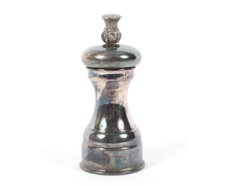 A silver pepper grinder with thistle finial. Maker Sidney Beddall, Sheffield 1968. Weight 162 grams.