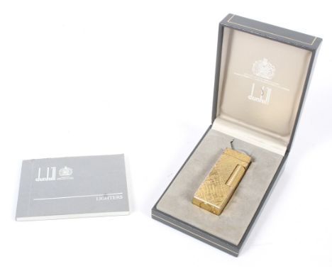 A Vintage gilt Dunhill lighter in original box with original leaflet ref No24163