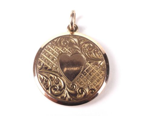 9ct gold  locket of circular form. With engine turned and floral decoration, one side with central heart, 5.2 grams.