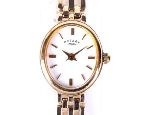 A contemporary ladies 9ct gold Rotary wristwatch in original box. The oval dial with gilt batons denoting hours, the case bac