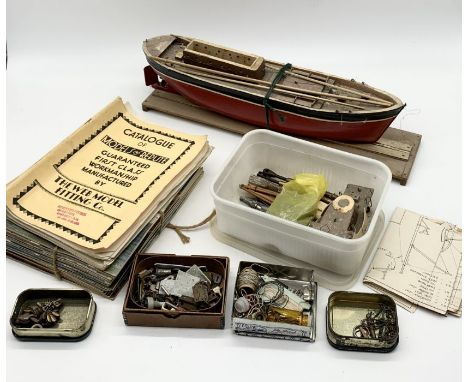 A part finished vintage model boat along with a box of parts and tools plus a quantity of Model Boats magazines
