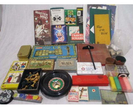 A collection of various vintage board games including Travel Scrabble, Royal Game of UR, Autobridge, Solitaire, Super Masterm