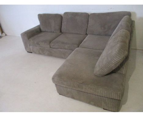 An open end corner sofa in grey jumbo cord 