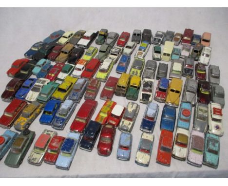 A collection of vintage play worn die-cast vehicles including Corgi Toys, Solido, Dinky Toys etc