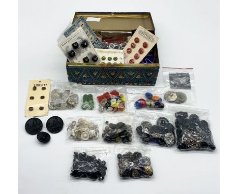 A collection of vintage buttons including a set of Liberty carded buttons