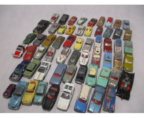 A collection of vintage play worn die-cast vehicles including Dinky Toys, Corgi Toys etc