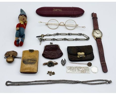 A collection of miscellaneous items including 9ct gold ammonite brooch, unmarked gold stick pin (A/F), felt Noddy, Alprosa wa