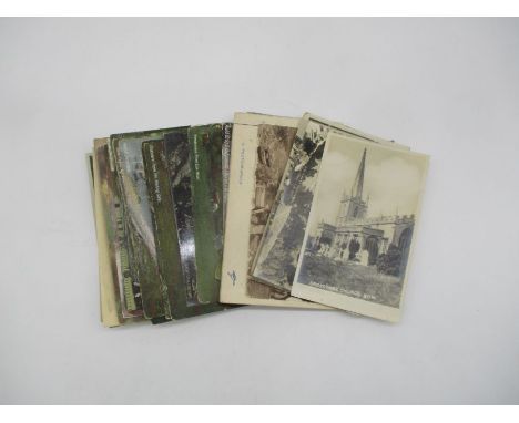 A quantity of vintage postcards.