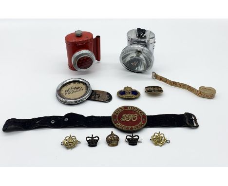 A collection of Post Office items including GPO badges including postman tie badge, bicycle lamp, tape measure etc.