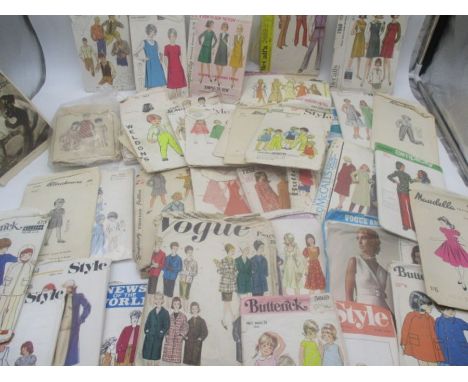 A collection of vintage sewing patterns including Vogue