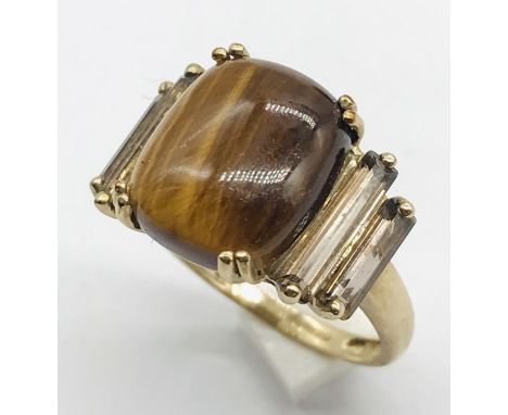 A 9ct ring set with tiger's eye and quartz 