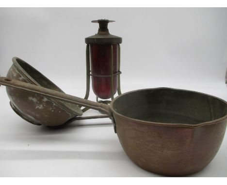 A ships brass explosion proof and red glass dome light along with a copper saucepan etc.