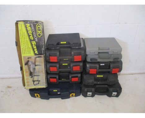A collection of various cased/boxed power tools and accessories including a Titan power drill, soldering gun, Pro pruning/mul
