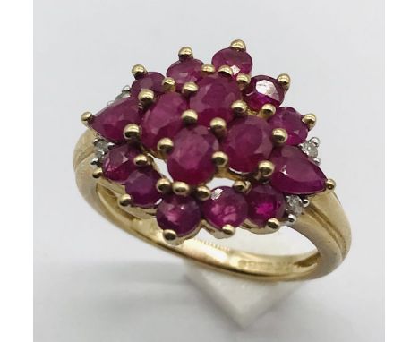 A ruby cluster ring in 9ct gold