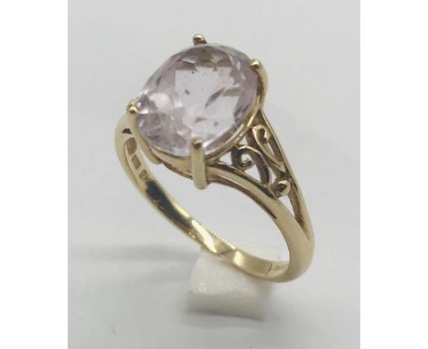 A pale amethyst solitaire ring set in 9ct gold