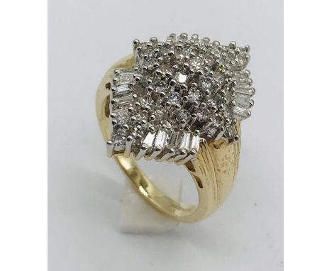 A 14ct gold dress ring set with diamonds, total weight 6g