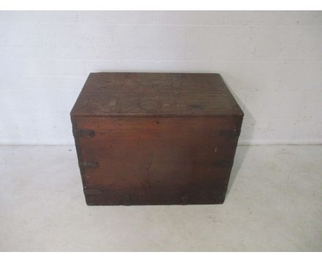 An antique oak metal bound storage trunk, length 84cm, height 65cm.