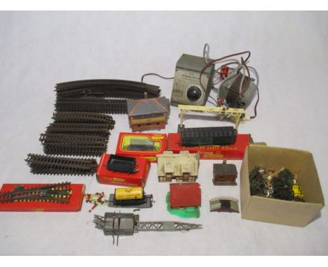 A collection of model railways 00 gauge including Tri-ang Hornby rolling stock, building, scenery, signals, various track, H&