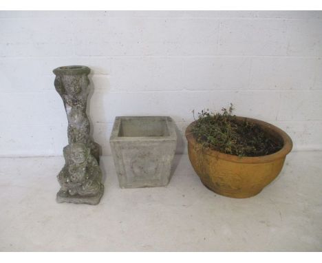 A large ceramic Oriental planter, along with a reconstituted stone planter, a sitting Buddha and a figure of a cherub. 