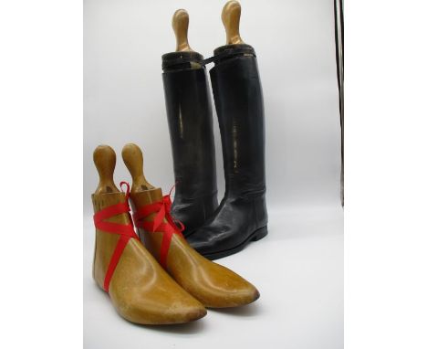 A pair of vintage leather riding boots (size 10) with trees, along with a pair of boot lasts.
