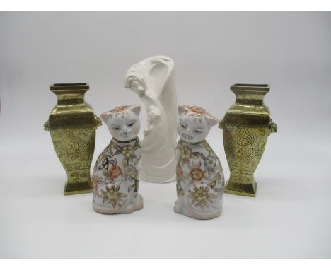 A pair of Oriental brass urns and china cats both with character marks to base along with a Goebel figure of two lions
