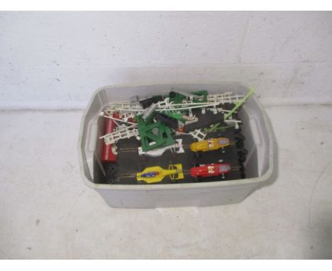 A quantity of Scalextric, including a pair of vintage Triang cars, track, controllers, accessories etc.