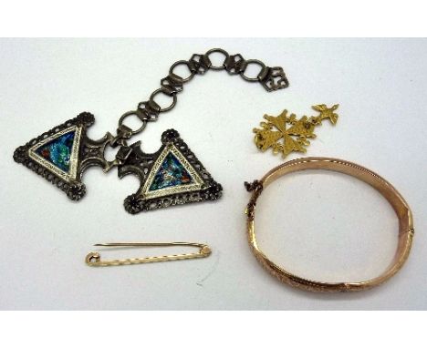 A Victorian 9ct gold bangle, a/f, a 9ct gold pin, a silver and enamel buckle of triangular form, enamel a/f and a yellow meta