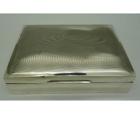 A silver cigarette box by Walker & Hall, Birmingham 1965, width 11cm
