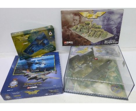 Three Corgi military model planes and a Corgi control tower kit; The Dam Busters, Battle of Britain and USAAF commemorative