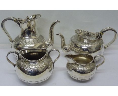 A Victorian four piece silver and silver plated tea service comprising a silver tea pot and cream jug by Goldsmiths &amp; Sil