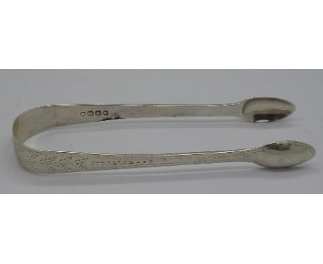 A pair of George IV silver sugar bows, London 1821