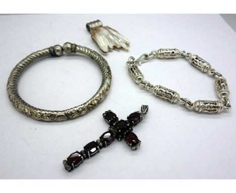 A silver and garnet cross pendant, a silver and blister pearl pendant and two bracelets