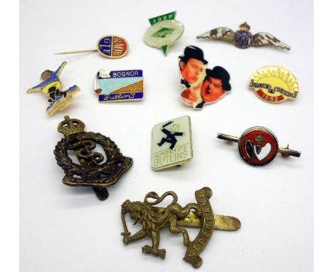 Five Butlins badges, a silver Blood Donor badge, an R.A.F. badge, etc.