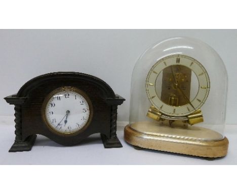 An oak cased mantel timepiece and a Junghans ATO Anticlimatic mantel clock