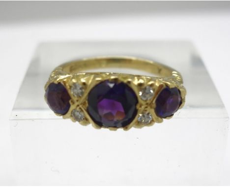 An 18ct gold amethyst and diamond ring, weight 6g, size K