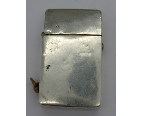 A sterling silver lighter