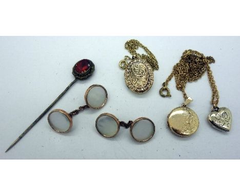 Three lockets with chains, a pair of cufflinks and a stick pin