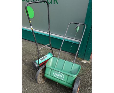 Manual power base cylinder mower and seed spreader box