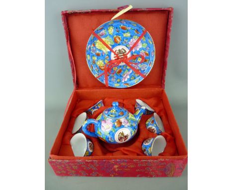 Cased Oriental miniature tea service