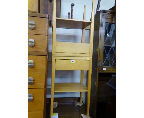 Pair of light wood single drawer bedside tables with under shelves