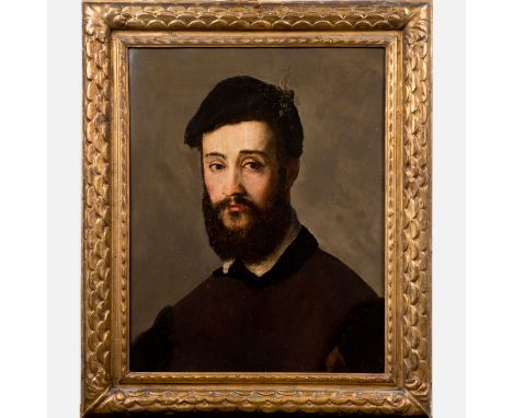 Bartolomeo Passarotti (1529-1592)-attributed, Portrait of a bearded young man, oil on wooden panel; in carved an gilded frame