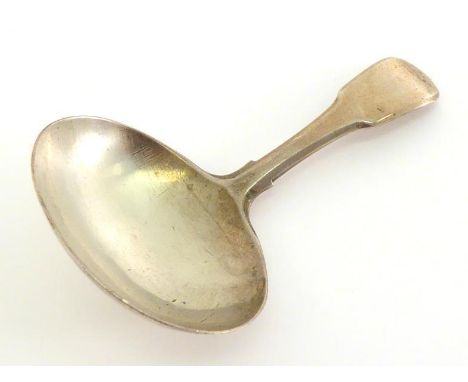 A George III silver Fiddle pattern caddy spoon with oval bowl by Peter & William Bateman, London, 1808, 7.7 cm. long, wt. 14 