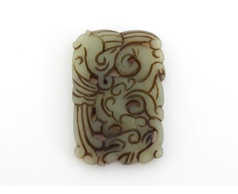 A Chinese carved jade plaque, carved and pierced with dragon and phoenix on both sides, size: 5.5cm x 3.8cm, in good conditio