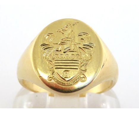 An 18 carat gold signet ring, engraved with a coat of arms, fully hallmarked, finger size O, 8.7gms CONDITION: good 