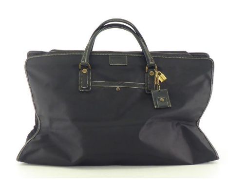 A Gianfranco Ferre Black travel bag with leather accents and goldtone Ferre padlock complete with 3 keys. CONDITION: Good, sh