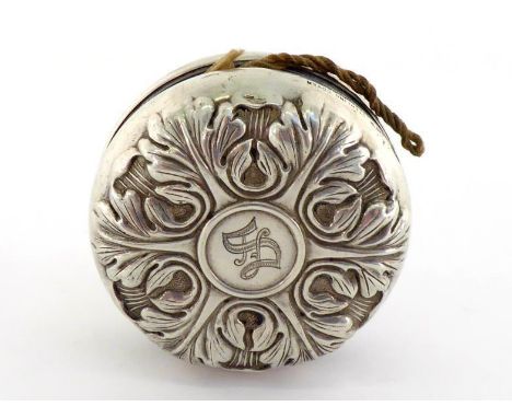 An American silver yoyo with steel core, stamped on both sections "L.S.M. STERLING COVER STEEL BODY", circa 1880, chased with