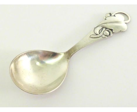A Danish silver caddy spoon, maker's mark JS in monogram, probably for Isabelle J. Steftensen, Copenhagen, 1947, with partial