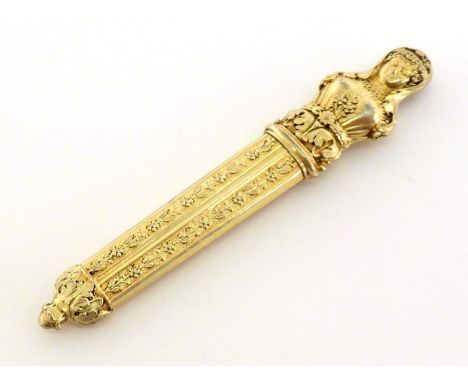 A French silver-gilt needle/bodkin case, first half of 19th century, pull-off top in form of a Classical female bust, the tap